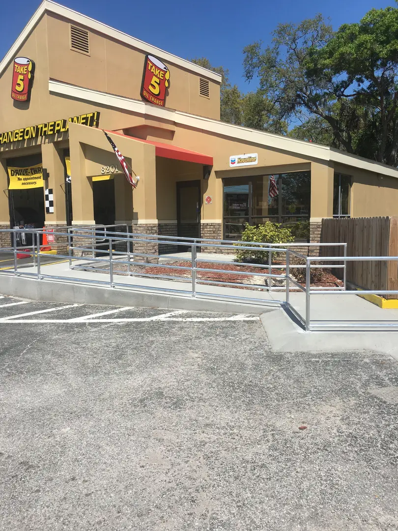 Metal handrails along the smooth walkway